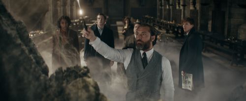 Jude Law, Dan Fogler, Eddie Redmayne, Jessica Williams, and Callum Turner in Fantastic Beasts: The Secrets of Dumbledore