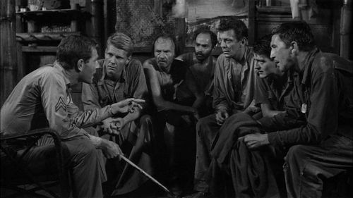 George Segal, William Fawcett, James Fox, Patrick O'Neal, Sam Reese, Michael Stroka, and Joe Turkel in King Rat (1965)
