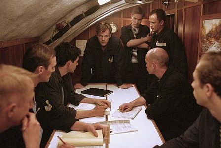 (Left to right) (hand to face, red hair) Gerrit Vooren as Voslensky, Ingvar Sigurdsson as Gorelov, Christian Camargo as 