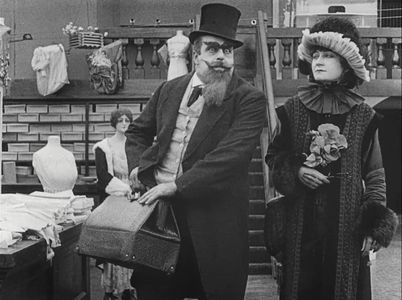 Eric Campbell and Charlotte Mineau in The Floorwalker (1916)
