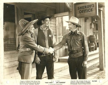 Kirby Grant, Francis McDonald, and Glenn Strange in Bad Men of the Border (1945)