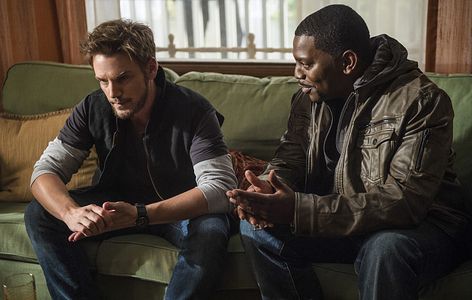 Mekhi Phifer and Riley Smith in Frequency (2016)