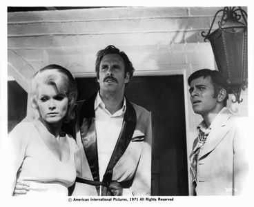 Pat Priest , Bruce Dern, and Casey Kasem looking to their right in a scene from the film 'The Incredible 2-Headed Transp