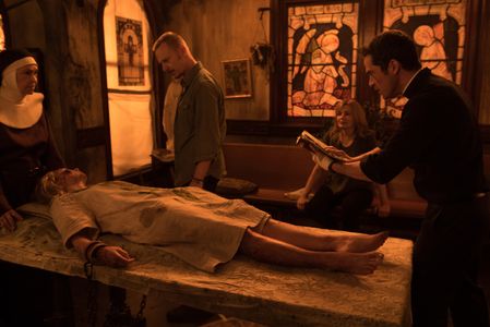 Geena Davis, Ben Daniels, Deanna Dunagan, Alfonso Herrera, and Hannah Kasulka in The Exorcist (2016)