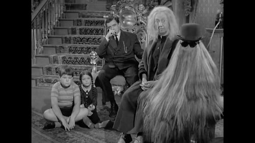 John Astin, Marie Blake, Lisa Loring, Felix Silla, and Ken Weatherwax in The Addams Family (1964)
