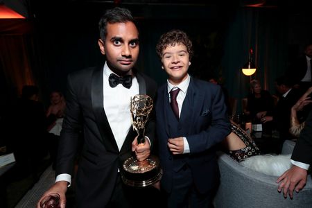 Aziz Ansari and Gaten Matarazzo at an event for The 69th Primetime Emmy Awards (2017)