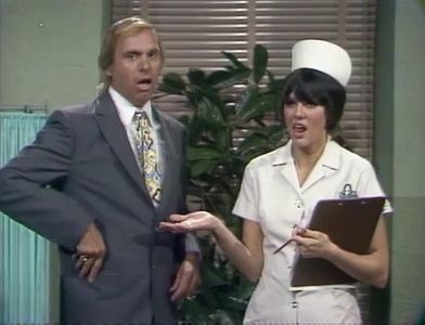 Nancie Phillips and Alan Sues in Rowan & Martin's Laugh-In (1967)