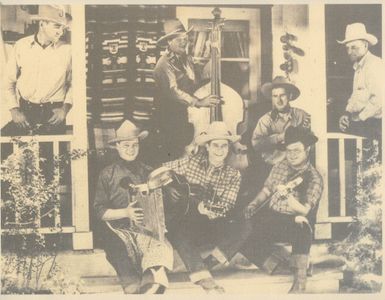 Ken Card, Earl Phelps, Norman Phelps, Willie Phelps, Ray Whitley, and The Six Bar Cowboys in Bandits and Ballads (1939)