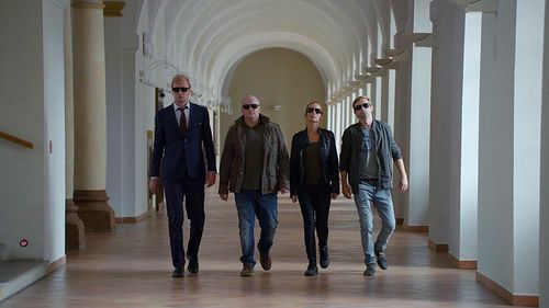 David Novotný, Martin Pechlát, Hana Vagnerová, and Lukás Príkazký in The Case of the Dead Deadman (2020)