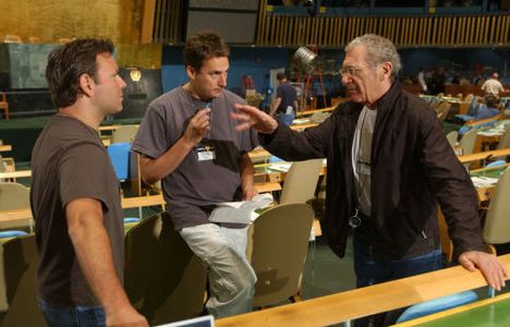 (L to r) Producer KEVIN MISHER, Producer TIM BEVAN and Director/Executive Producer SYDNEY POLLACK on the floor of the Ge
