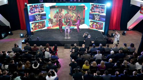 Kofi Kingston, Austin Watson, and Ettore Ewen at an event for WrestleMania 35 (2019)