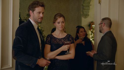 Nicholas Delany and Paige Herschell in Next Stop, Christmas (2021)