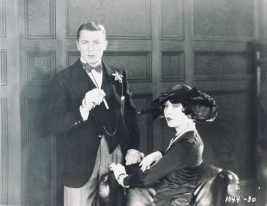 Clive Brook and Jocelyn Lee in Afraid to Love (1927)