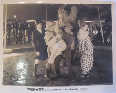 Edward Burns, Helen Ferguson, Jack Mulhall, and Eddie Phillips in Wild West (1925)