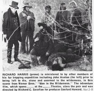 Richard Harris, John Huston, Percy Herbert, and Dennis Waterman in Man in the Wilderness (1971)
