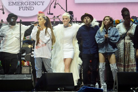 The Black Eyed Peas, Miley Cyrus, Taboo, Will.i.am, Imogen Heap, Katy Perry, Ariana Grande, and Niall Horan at an event 