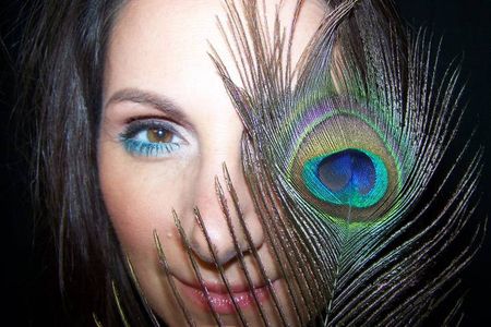 Meli Alexander - Fun with feathers at a MAC artist shoot!