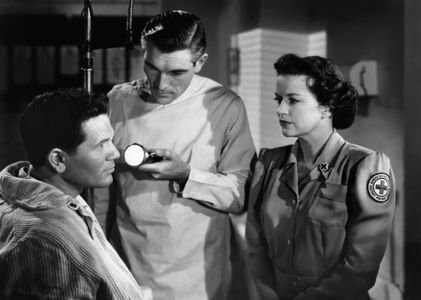 John Garfield, Rosemary DeCamp, and Rory Mallinson in Pride of the Marines (1945)