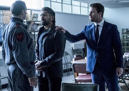 Manu Bennett, Paul Cowling, and Stephen Amell in Arrow (2012)