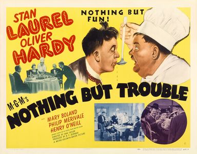 Oliver Hardy, Mary Boland, Stan Laurel, Philip Merivale, Henry O'Neill, and Joe Yule in Nothing But Trouble (1944)