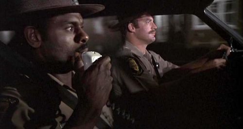 Armand Cerami and Steven Williams in The Blues Brothers (1980)