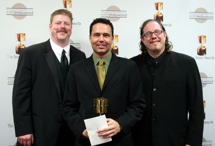 Effects animation winner James Mansfield with presenters John DiMaggio and Fred Tatasciore