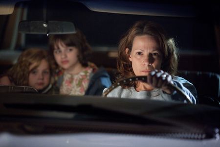 Lili Taylor, Joey King, and Kyla Deaver in The Conjuring (2013)