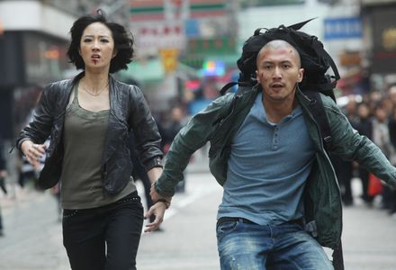 Nicholas Tse and Gwei Lun-Mei in The Stool Pigeon (2010)