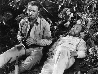 John Wayne and Alex Havier in Back to Bataan (1945)