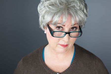 Veronica Scheyving-Commercial Headshot-Grey Grandma Wig & Black Glasses