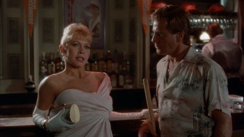 Ryan O'Neal and Debra Stipe in Tough Guys Don't Dance (1987)