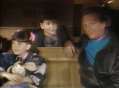 Jeffrey Jones, Jaclyn Bernstein, and Chance Quinn in The People Next Door (1989)
