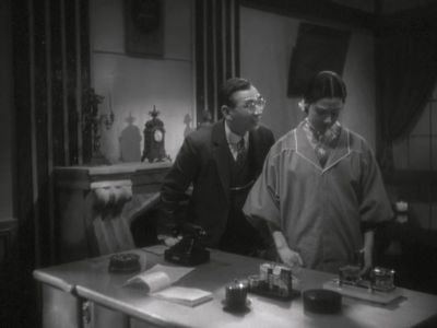 Benkei Shiganoya and Isuzu Yamada in Osaka Elegy (1936)