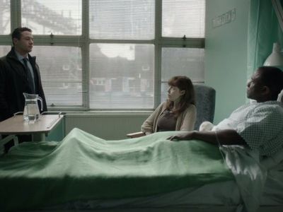 Maria Miles, Warren Brown, and Lucian Msamati in Luther (2010)