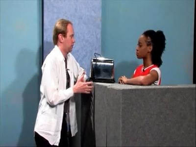 Tom Myers and Brittany Williams in a television production at Towson University, Towson, MD. (2012)