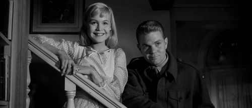 Sandra Dee and John Wilder in Until They Sail (1957)