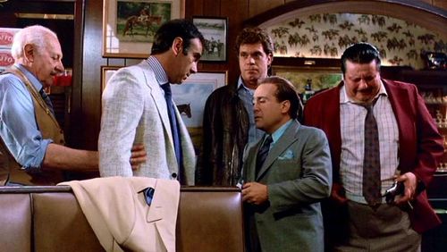 Danny DeVito, Dan Hedaya, Lou Albano, Joe Piscopo, and Henry Stewart in Wise Guys (1986)