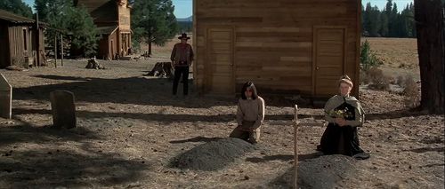 Katharine Hepburn, John Wayne, and Richard Romancito in Rooster Cogburn (1975)