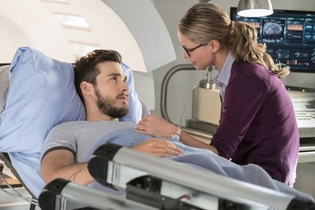 Melissa Benoist and Chris Wood in Supergirl (2015)