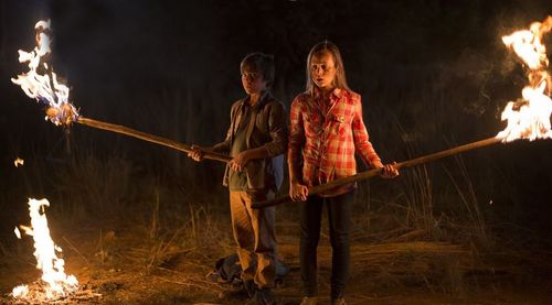 John Paul Ruttan and Ella Ballentine prepare for their fight with a lion in, Against The Wild: Survive The Serengeti. Ma