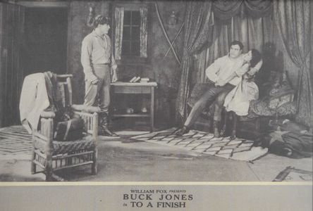 Helen Ferguson, Buck Jones, and Norman Selby in To a Finish (1921)