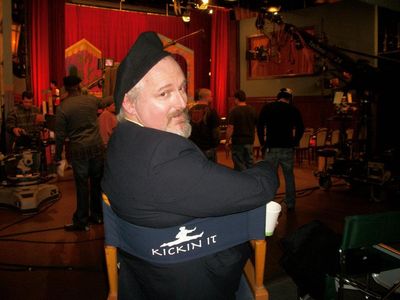 Relaxing on the set of Disney's Kickin iT! playing theatre critic Vic DeBlaze.