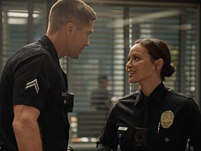 Eric Winter and Melissa O'Neil in The Rookie: The Bet (2019)