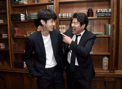 Song Kang-ho and Choi Woo-sik at an event for Parasite (2019)