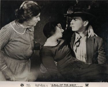 Matt Moore, Dorothy Revier, and Kathrin Clare Ward in Call of the West (1930)