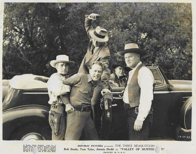 Kenne Duncan, George N. Neise, Edward Van Sloan, and Roland Varno in Valley of Hunted Men (1942)