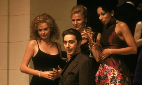 Al Pacino, Charlize Theron, Pamela Gray, and Tamara Tunie in The Devil's Advocate (1997)