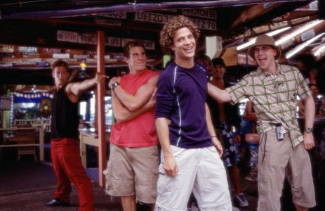 (L-R) Brandon (Greg Siff, in red), Justin (Justin Guarini) and Eddie (Brian Dietzen) enjoy Spring Break in Miami (Backgr