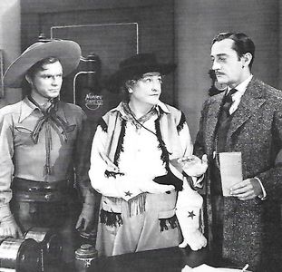 Maude Allen, Don 'Red' Barry, and Harry Worth in Adventures of Red Ryder (1940)