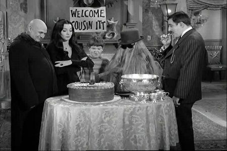 Jackie Coogan, John Astin, Carolyn Jones, Felix Silla, and Ken Weatherwax in The Addams Family (1964)